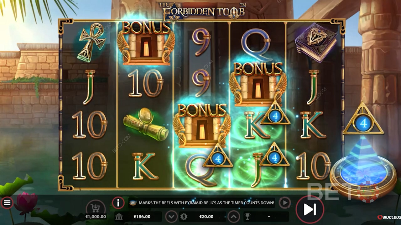 قم بتشغيل اللفات المجانية مع 5 إلى 10 Wilds في لعبة فيديو The Forbidden Tomb من Nucleus Gaming